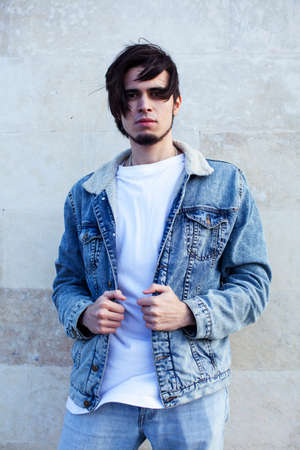 young pretty hipster boy outside, lifestyle people conceptの写真素材