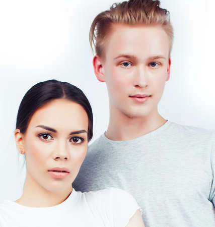 modern hipster guys together couple diverse nations, asian girl and caucasian blond boy isolated on...