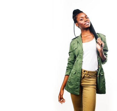 young pretty african-american girl posing cheerful emotional on white background isolated, lifestyle people conceptの写真素材