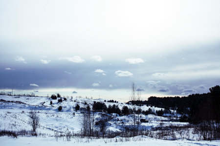 winter day landscape, snow hills and natureの写真素材