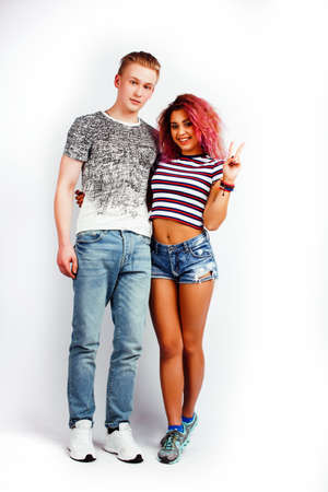 best friends teenage girl and boy together having fun, posing emotional on white background...