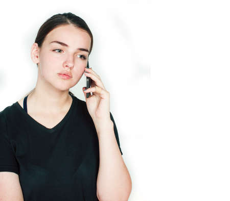 young pretty girl pointing on white background, business science people conceptの写真素材