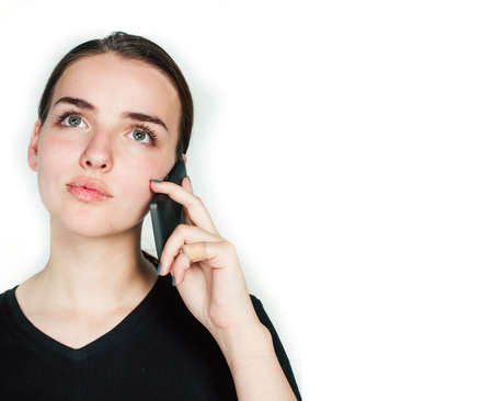 young pretty girl pointing on white background, business science people concept