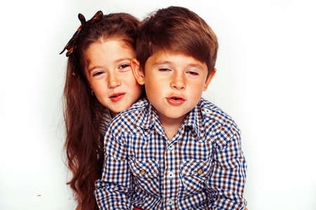 little cute boy and girl hugging playing on white background, happy smiling family, lifestyle people...