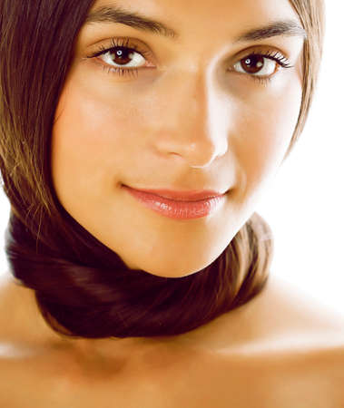young fresh brunette tan girl with beauty hairstyle isolated on white closeup, soft spa faceの写真素材