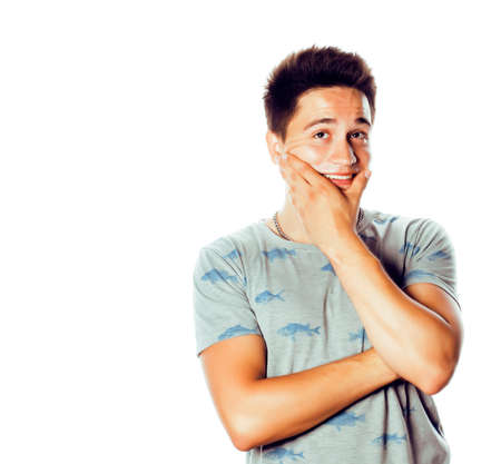 young attractive man isolated thinking emotional on white closeup gesturing smiling, lifestyle people conceptの写真素材