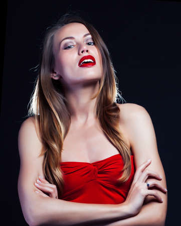 beauty rich woman with bright makeup wearing luxury jewellery on black background, fashion ladyの写真素材