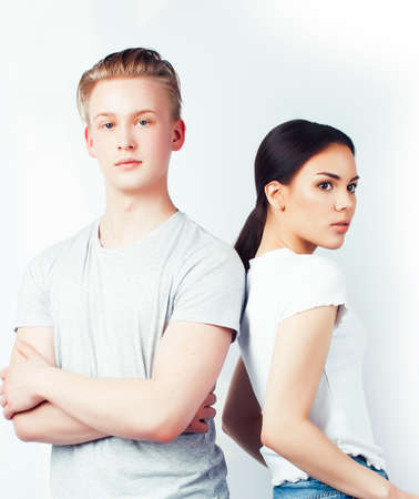 modern hipster guys together couple diverse nations, asian girl and caucasian blond boy isolated on white background, lifestyle people conceptの写真素材
