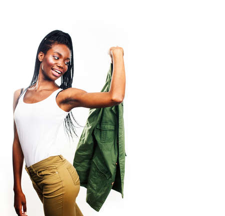 young pretty african-american girl posing cheerful emotional on white background isolated, lifestyle people conceptの写真素材