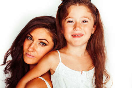 bright picture of hugging mother and daughter happy together, smiling stylish family. lifestyle people conceptの写真素材