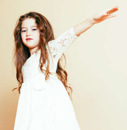 little cute spring girl in fancy dress isolated on white background, fashion stylish kid, lifestyle people conceptの写真素材