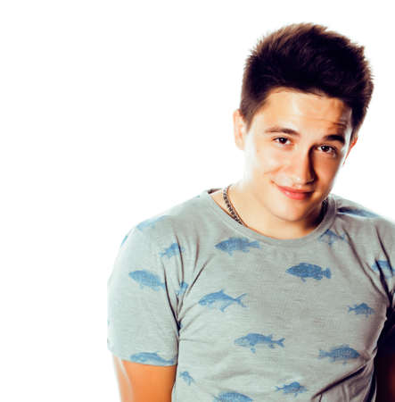 young attractive man isolated thinking emotional on white closeup gesturing smiling, lifestyle people conceptの写真素材