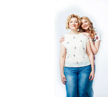 mother with daughter together posing happy smiling isolated on white background with copyspace, lifestyle people conceptの写真素材