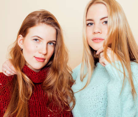 best friends teenage girls together having fun, posing emotional on white background, besties happy smiling, lifestyle people concept close up. making selfieの写真素材