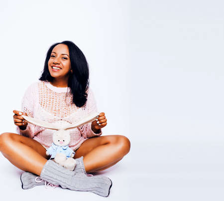 young pretty african american woman pregnant happy smiling, posing on white background isolated , lifestyle people concept copyspace close upの写真素材