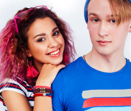 best friends teenage girl and boy together having fun, posing emotional on white background isolated, latin american and caucasianの写真素材