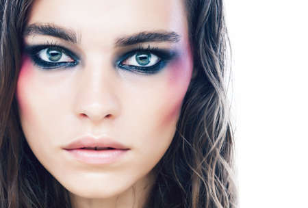 young pretty caucasian girl with fashion style makeup bright colの写真素材