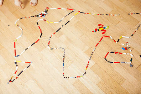 toys at home floor, lifestyle children concept, world map with piecesの写真素材