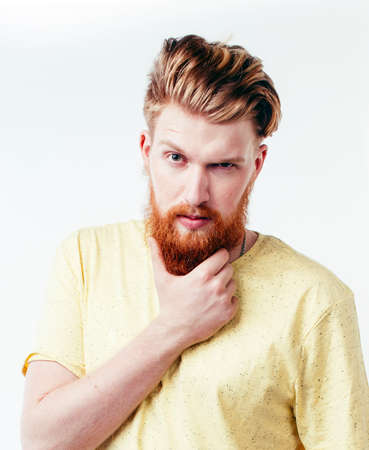young handsome hipster ginger bearded guy looking brutal isolated on white background, lifestyle people conceptの写真素材