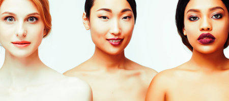 different nation woman: african-american, caucasian, asian together isolated on white background happy smiling, diverse type on skin, lifestyle people conceptの写真素材