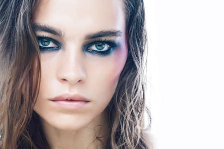 young pretty caucasian girl with fashion style makeup bright colの写真素材