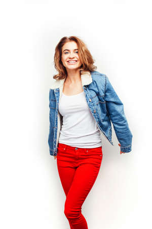 young pretty stylish hipster girl posing emotional isolated on white background happy smiling cool smile, lifestyle people conceptの写真素材