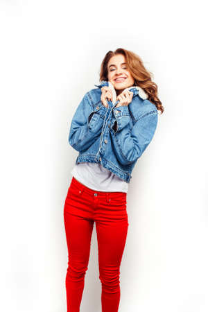 young pretty stylish hipster girl posing emotional isolated on white background happy smiling cool smile, lifestyle people conceptの写真素材