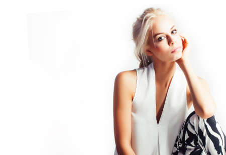 young pretty woman with blond hair on white background, sensual makeup, fashion sexy look, lifestyle people conceptの写真素材