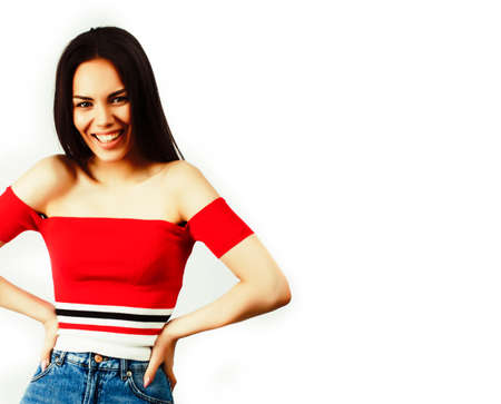 young happy smiling latin american teenage girl emotional posing on white background, lifestyle people conceptの写真素材