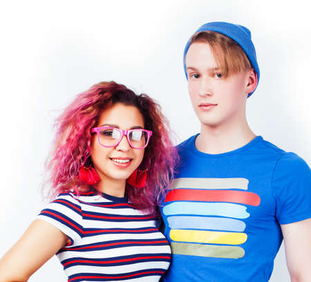 best friends teenage girl and boy together having fun, posing emotional on white background isolated, latin american and caucasianの写真素材