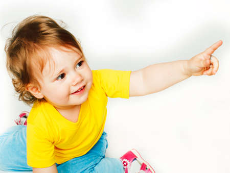 little cute daughter girl on white, happy smiling family inside isolated adorable, lifestyle modern people conceptの写真素材