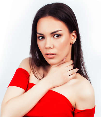 young happy smiling latin american teenage girl emotional posing on white background, lifestyle people conceptの写真素材