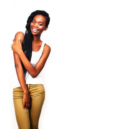 young pretty african-american girl posing cheerful emotional on white background isolated, lifestyle people conceptの写真素材