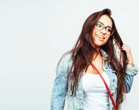 young happy smiling latin american teenage girl emotional posing isolated on white background, lifestyle people conceptの写真素材