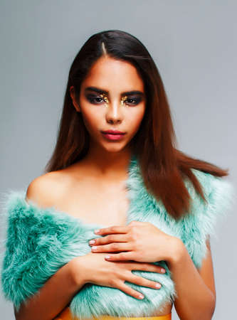 young pretty african-american woman posing in fashion clothers emotional, lifestyle people conceptの写真素材