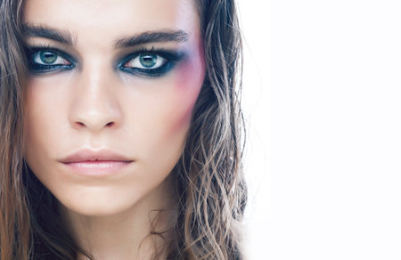 young pretty caucasian girl with fashion style makeup bright colの写真素材