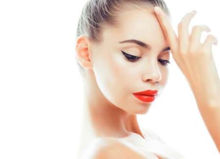 young pretty brunette real woman close up isolated on white background. Fancy fashion makeup, natural look spaの写真素材