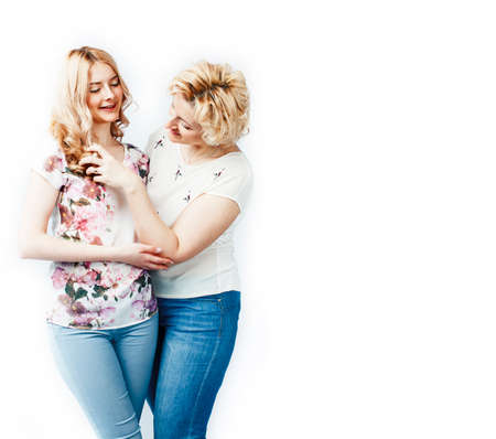 mother with daughter together posing happy smiling isolated on white background with copyspace,...
