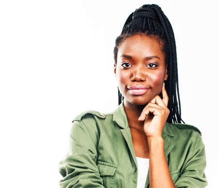 young pretty african-american girl posing cheerful emotional on white background isolated, lifestyle people conceptの写真素材
