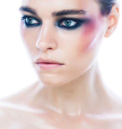 young pretty caucasian girl with fashion style makeup bright colの写真素材