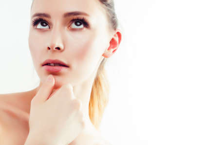 young sweet brunette woman close up isolated on white background, perfect pure innocense beautifulの写真素材