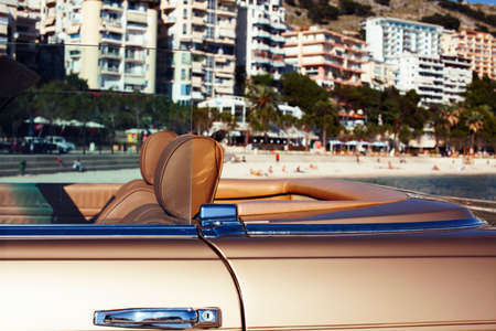 real old fashion cabriolet car at seaside touristic view lifestyle