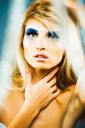 beauty young snow queen in fairy flashes