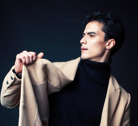 handsome asian fashion looking man posing in studio on black background, lifestyle modern people conceptの写真素材