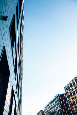 view on new modern buildings, facade corner and sky, real houses on lineの写真素材