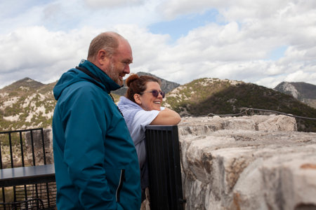 senior friends tourists outdoor adventure together on mediterranian seaの写真素材