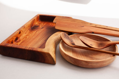 Wooden kitchen utensils stacked view, spoon and spatulaの写真素材