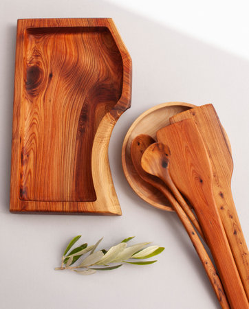 Wooden kitchen utensils stacked view, spoon and spatulaの写真素材