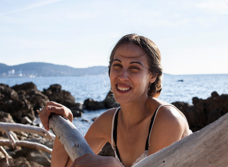 young pretty girl at the beach, lifestyle people conceptの写真素材