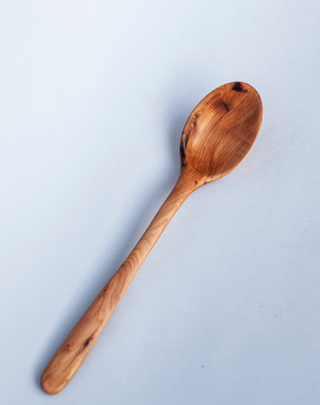 Wooden kitchen utensils stacked view close upの写真素材
